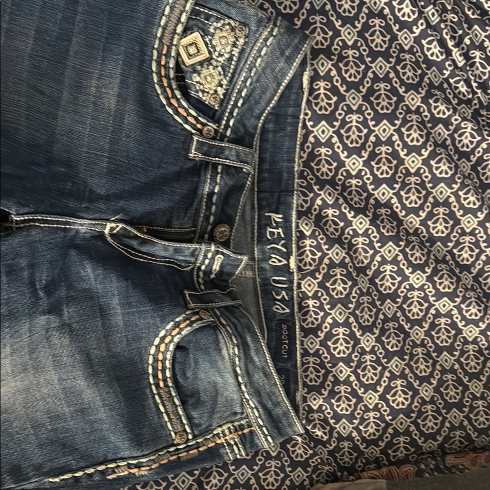Blue Boot Cut Jeans with Distressed Vintage Look
